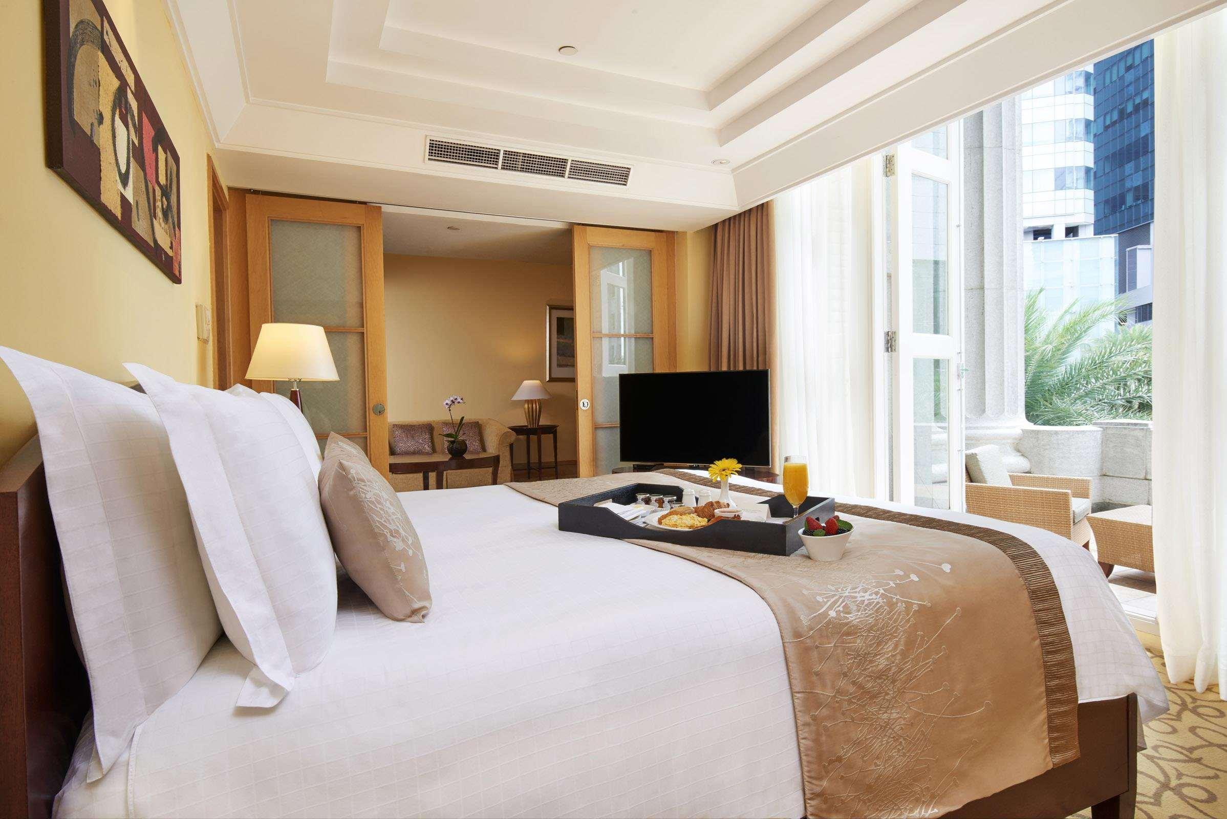 فندق ذا فولرتون سنغافورة المظهر الخارجي الصورة A bedroom at the hotel